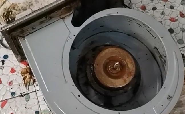 带电清洗油烟机的方法和注意事项（保持厨房空气清新）