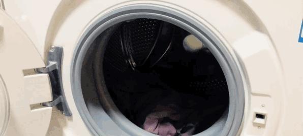 解决洗衣机洗完衣服潮湿的问题（快速有效的干衣方法与技巧）